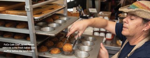 FoCo Cafe Chef Jarrett Parten removes muffins