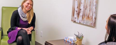 Sonny Pickowitz chats with a staff member at SummitStone Health Partners Crisis Stabilization Unit and Walk-in Crisi Center in Fort Collins. Sonny Pickowitz chats with a SummitStone staff member