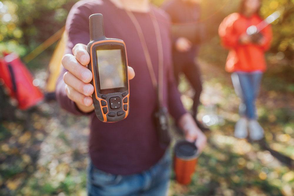 satellite phone in hand